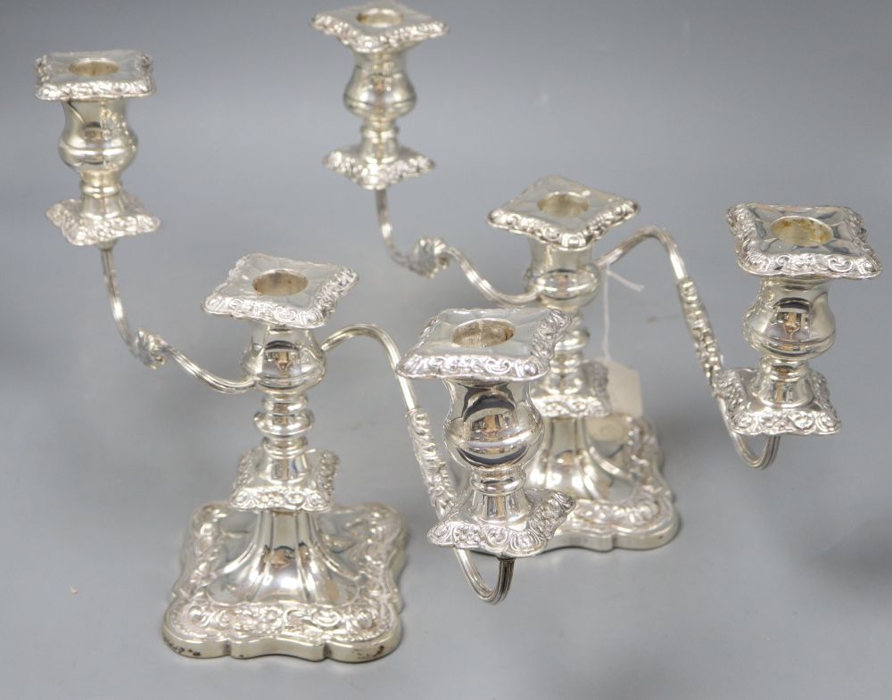 A pair of mid 20th century silver dwarf three light, two branch candelabra, Viners Ltd, Sheffield, 1956/7, weighted, height 21.4cm.